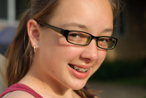 Girl with Glasses & Braces
