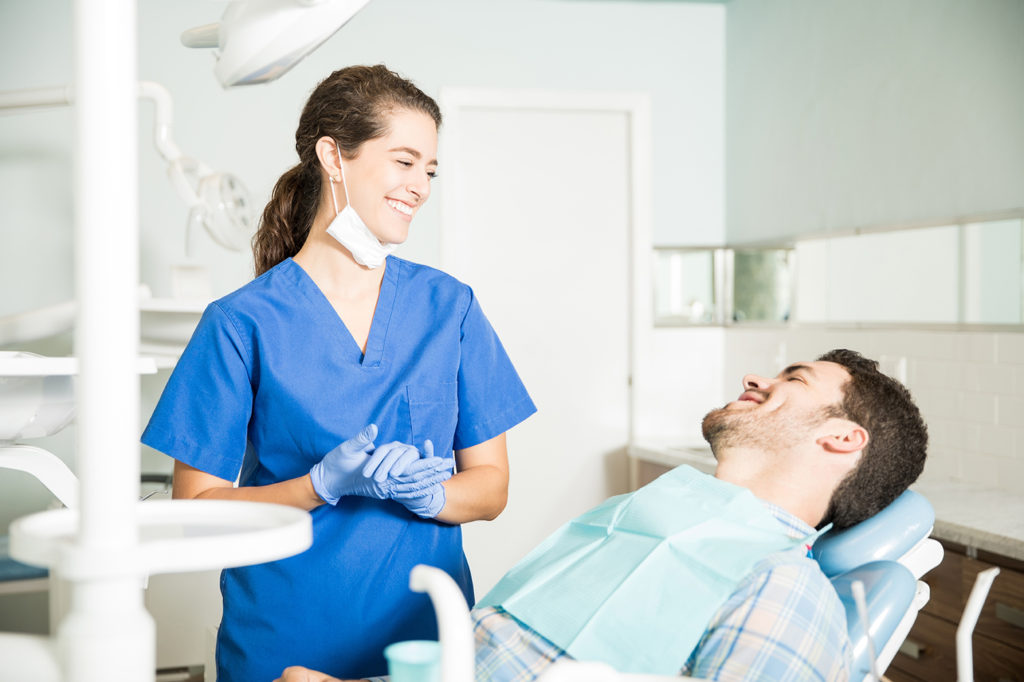 orthodontist tells patient about invisalign